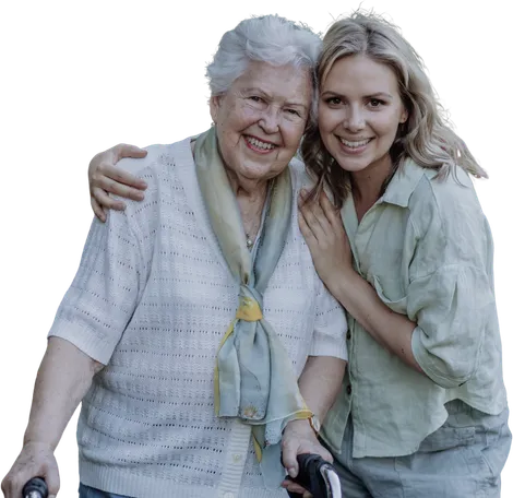 Une aidante accompagne une dame âgée chez elle